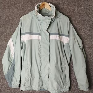 Columbia light green women’s lined waterproof jacket size large